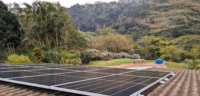 Rooftop solar array overlooking the Kloof valley